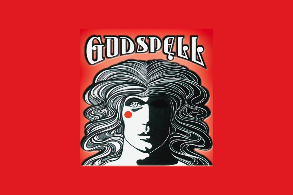 Godspell musical poster featuring stylized face with flowing hair and red dot on cheek against red background
