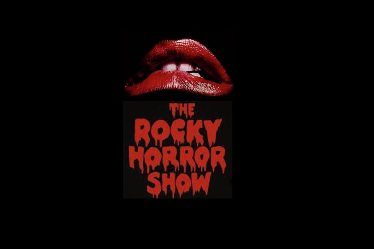 Red lips biting on black background with The Rocky Horror Show title in dripping red horror font below