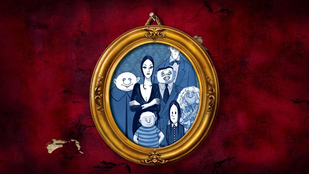Addams Family portrait in ornate gold frame showing Morticia, Gomez, Wednesday, Pugsley and other family members